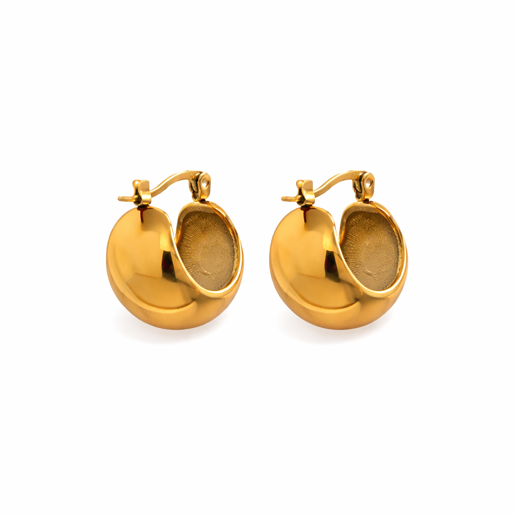 Classic gold huggie hoops designed for everyday wear. Lightweight, minimal and perfect for effortless, layered styling.