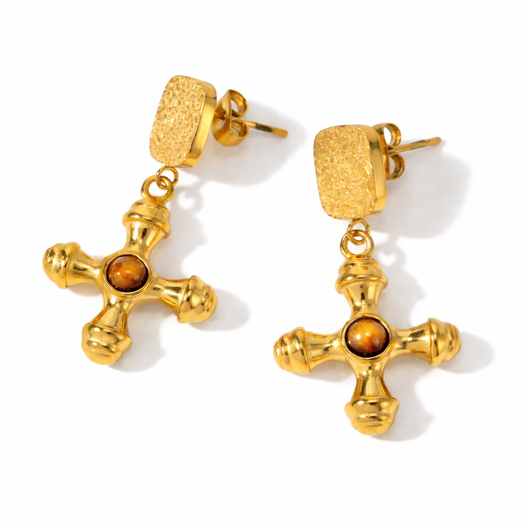 Gold earrings with natural tiger’s eye stone. Warm, earthy and perfect for adding a refined, grounding touch to your style.