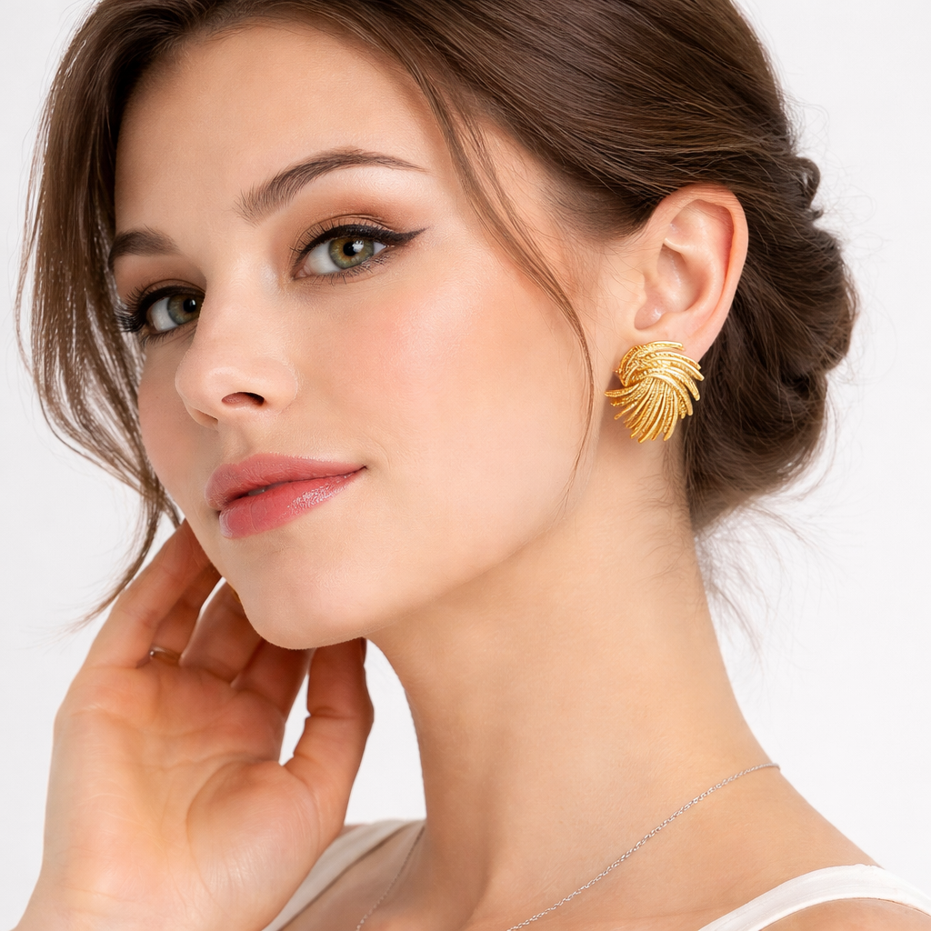 Gold twisted earrings lightweight statement earrings modern sculptural style