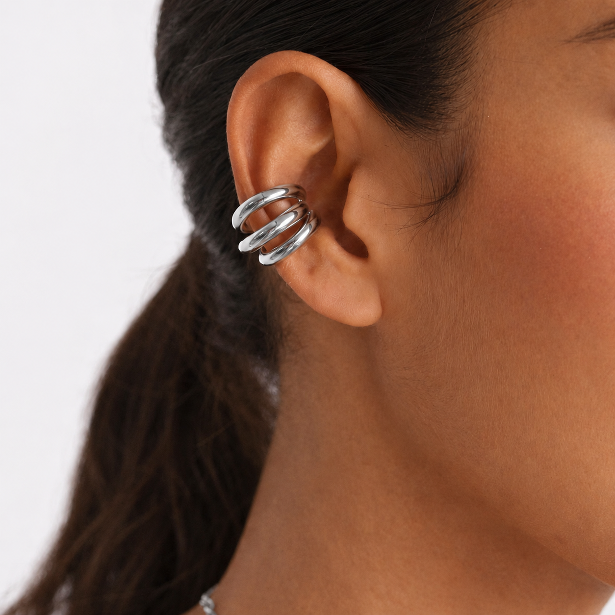 Silver orbit ear cuff model me the label