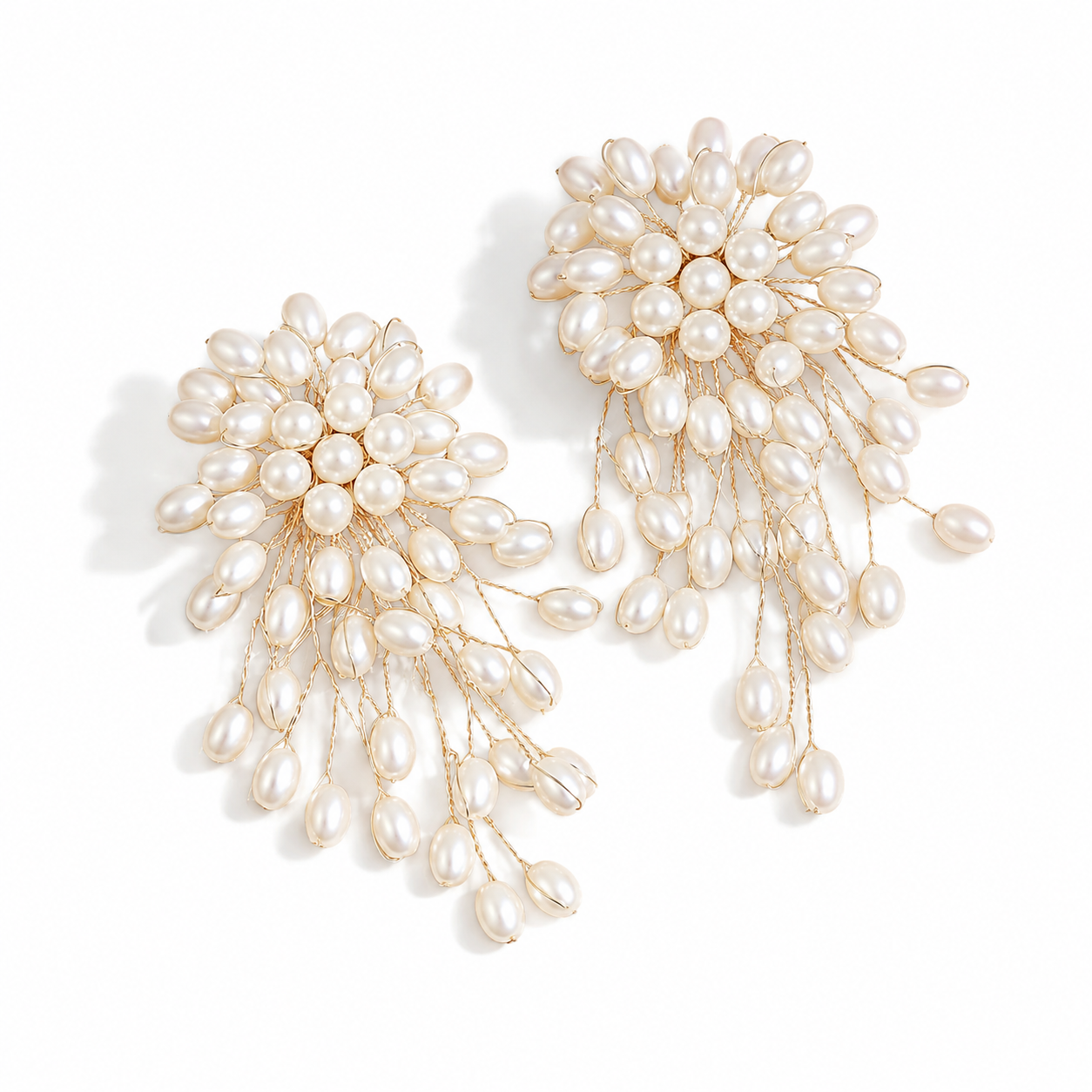 pearl drop statement earrings gold cascading design
