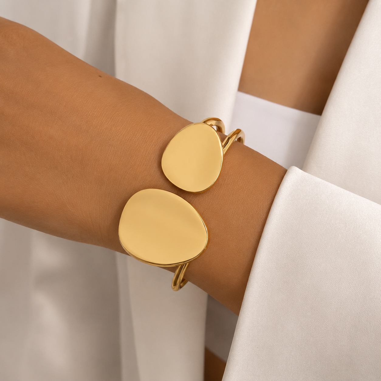 gold disc cuff bracelet modern sculptural design